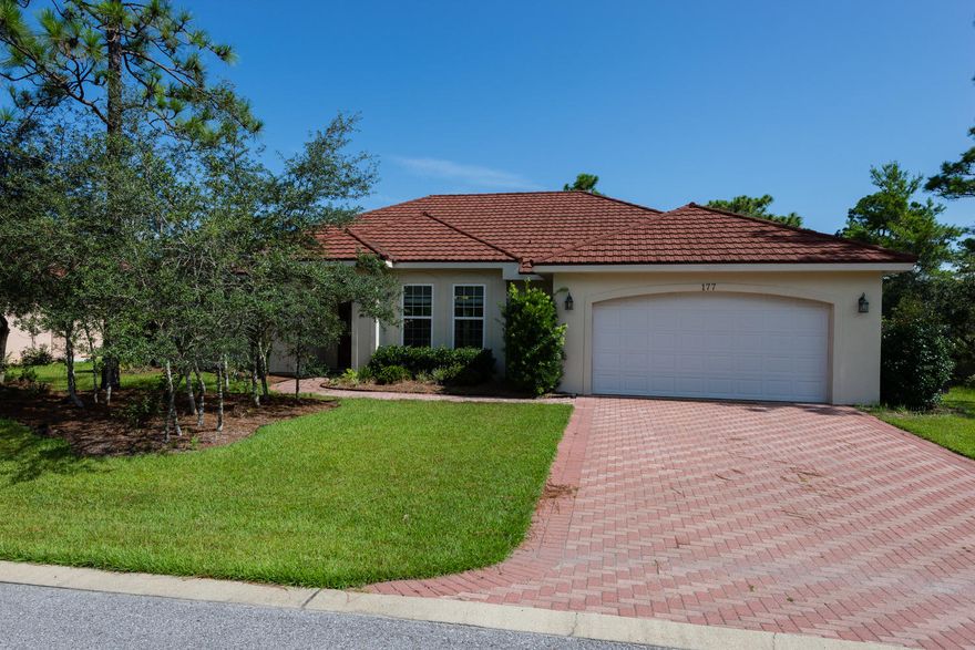 Wonderful home on large partially fenced large cleared lot featuring tankless hot water heater, expanding foam insulation, metal roof, fully irrigated lot with lawn pump, granite countertops in kitchen and baths, hardwood floors, tile in kitchen & baths. Large his & hers master closets with private access to huge covered patio from master bedroom. Lot extends beyond fence to the rear of the property. No flood insurance required. Quiet street convenient to Sacred Heart Hospital and shops and restaurants at Grand Boulevard.