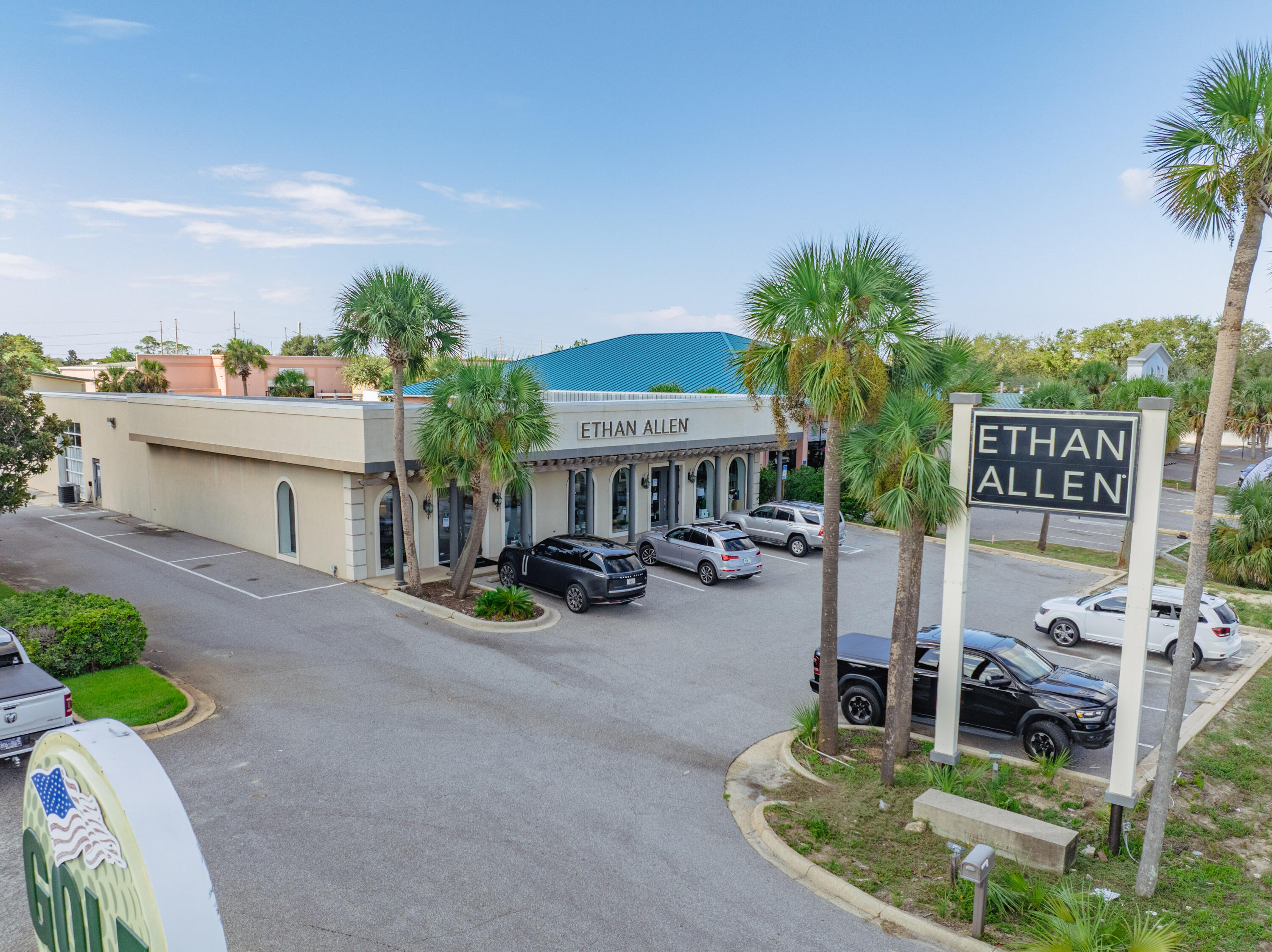 Exceptional freestanding retail building formerly occupied by Ethan Allen Home Design Studio, located along the most synergistic stretch of Highway 98 in Destin, Florida!  Its expanse of nearly 7,500 square feet, beautifully finished throughout, together with its flex space, will accommodate a host of viable use scenarios.  The storefront exhibits beautiful architectural detail through its arbored trellis facade.  The logistics are exceptional, offering a service drive alongside the building, reaching a large commercial overhead door along the eastern building elevation, which is perfect for receiving from large trucks.  The rear of the parcel also offers phenomenal ingress/egress, which also contains a large overhead door.  The site contains +/-16 car parking spaces.