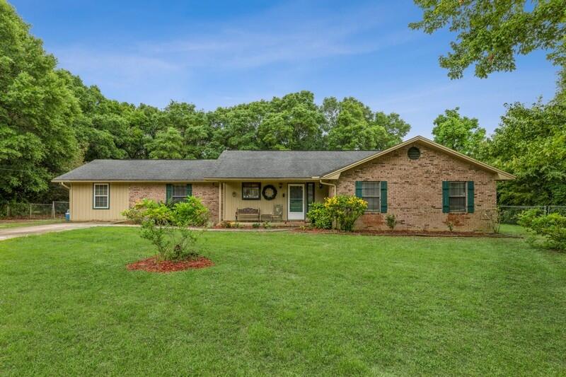 Pool home in Central Crestview! Large 1 acre flat lot, 3 bedrooms, 2 baths with second living space and man cave/bonus space! This home is ready for you to make it your own! Features include: wood burning fireplace, stainless steel appliances, oversized laundry room with full bath, No HOA, Lot access from front and back, fully fenced back yard, Shop with power and exhaust fan, back deck with gazebo over looking the fiberglass pool.