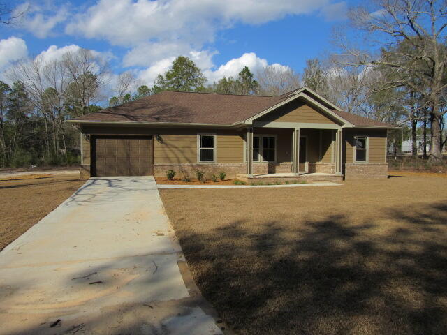 NEW CONSTRUCTION. .61 Acre lot with plenty of room to add a workshop. Goldilocks would want this home because its just right! Nice features to include a front and rear porch. A spacious kitchen with upgraded appliances to include a stainless steel dishwasher, a smooth top convection oven and built in microwave. The master bathroom features a shower only and a dressing area. The master bedroom closet includes a shoe rack area and a master hub for phone, internet, cable and security systems without having to run additional wiring. The entire home features 9' ceilings and crown molding in the main living area. This home has a great yard for the children and pets. Estimated completion is early February.Listing agent has ownership interest.