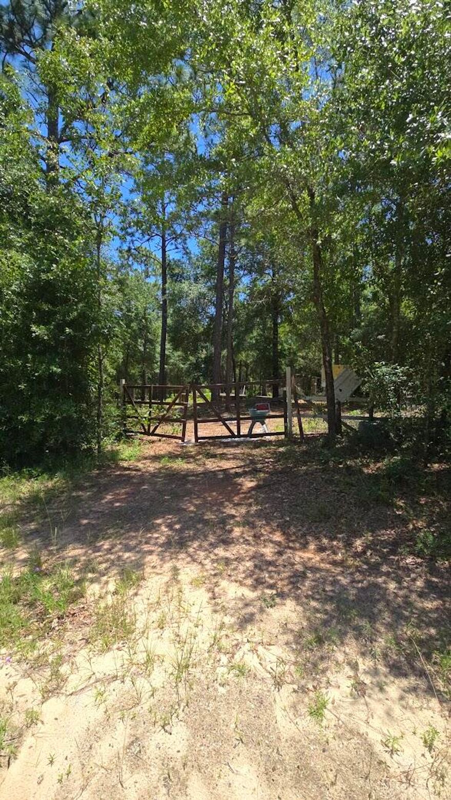 Here's your Chance to LIVE IN PARADISE on this 1-acre Corner Lot cleared, NO HOA and foundation already poured for home (seller to provide blueprint) and CABIN!! Cabin is partially finished so bring your ideas. Water meter already in place, electric nearby. New homes are being built add value to this beautiful piece of land! Just across the street is Clear Creek. PLUS NO FLOOD ZONE!! Lot is Fully fenced and gated. This won't last long so call your favorite Realtor today to view this gorgeous property!! Buyer to verify all details.