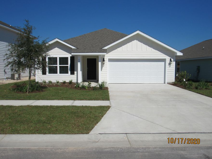 Brand new construction! This gorgeous 3 bedroom, 2 bath home is nestled in a new community within the highly coveted Hammock Bay, which features innumerable, top-notch amenities, including but not limited to multiple resort-quality pools, dog park, walking trails, fitness center, club house, tennis & basketball courts, General Store, playgrounds, Bay-front pavilion and dock, RV/Boat storage (separate fee), & more! This lovely home boasts gorgeous flooring and neutral paint throughout and a split, open floorplan, complete with a spacious living room, formal dining area, and plenty of cabinet/counter space in the kitchen (complete with stainless appliances, including a flat cooktop stove & side-by-side refrigerator being installed soon), island/breakfast bar, and walk-in pantry. The master bedroom has its own en suite with a double vanity, walk-in shower, garden tub, and separate toilet room, as well as a walk-in closet. Both guest bedrooms are nicely sized and share a full bath, as well. There is a laundry room, and there is a covered patio overlooking the backyard. Pets may be considered with prior owner approval and a non-refundable pet fee. No smoking.