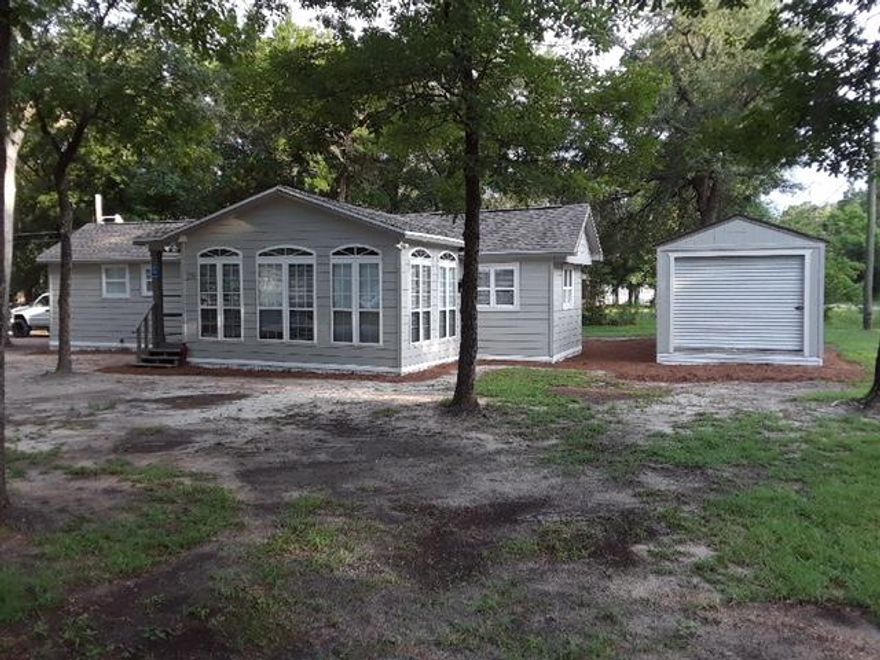 This jewel is set just minutes from the beautiful beaches of South Walton county on Florida's Emerald Coast! Large open great room for family to gather, spacious master suite, laminate floors, covered back porch all lend itself nicely to casual relaxed living no matter if you choose as your primary residence or a fantastic vacation getaway...one you will look forward to coming back to again and again! Large detached workshop has storage galore for water craft, tools, bikes...you name it! 2 Boat launch marina/landings w/in .5 miles from the house,Live Oak Landing & Black Creek. BRING YOUR BOAT! This home has a new roof, new painted exterior and much more!**MORE PICTURES TO COME!** Make an appointment to see today!