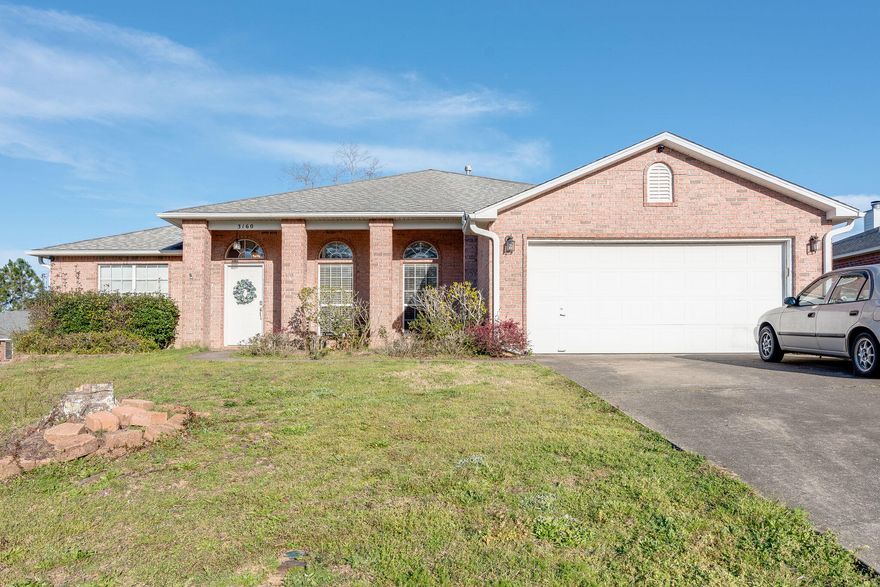 This charming all-brick home is a great opportunity for an investment property or a primary residence.  Located just north of Hwy 90, you are a short trip from all of the amazing things Pensacola has to offer, and an even shorter drive for work commutes via I-10/110.  With 4 bedrooms and 3 baths, an office and a formal dining room, this spacious floor plan offers plenty of room to plant your roots.  The large kitchen has a breakfast bar, island and pantry, providing storage and counter space to work with.  The master bathroom features separate garden tub and shower, while two of the additional bedrooms share a jack-and-jill style bathroom. Outside you will find a huge screened in porch perfect for relaxing.