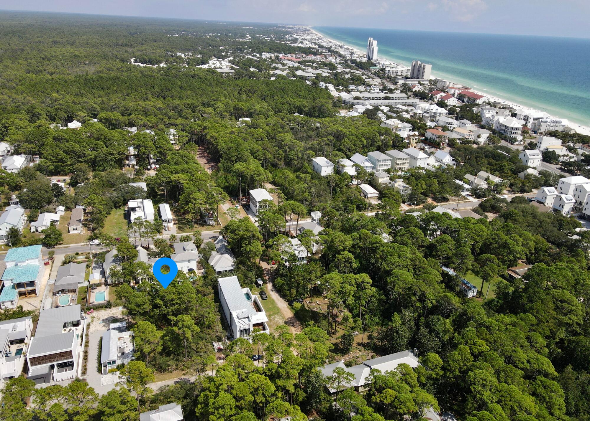 Exceptional opportunity in desirable Gulf Shore Manor in the heart of Seagrove Beach! This spacious wooded lot, 50x135 ft, offers endless potential for your coastal dream home. House plans and engineering designs are ready, featuring a stunning modern style with natural wood accents and a private courtyard. Located off 30A, this non-HOA community provides multiple beach access points. Embrace the tranquil surroundings and create your ideal beach retreat. Don't miss out on this prime slice of paradise! Contiguous lot is also available at additional offering.