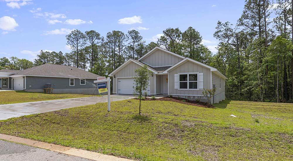 Located conveniently off of HWY 20 and 331, driving distance to Niceville, Destin, and the world-famous white sandy beaches of 30A in South Walton County. Limited opportunities to own new construction in the existing community 'The Canopies'. The 'Cali' plan features a spacious back porch, Hardie siding, 8' ceilings, vinyl flooring, carpet, Ivory shaker style cabinetry in the kitchen and bathrooms, laminate countertops and plenty of bright light. This energy efficient home offers 'Home is Connected' Smart Home package, DEAKO switches, 1-year builder warranty and 10-year structural warranty.