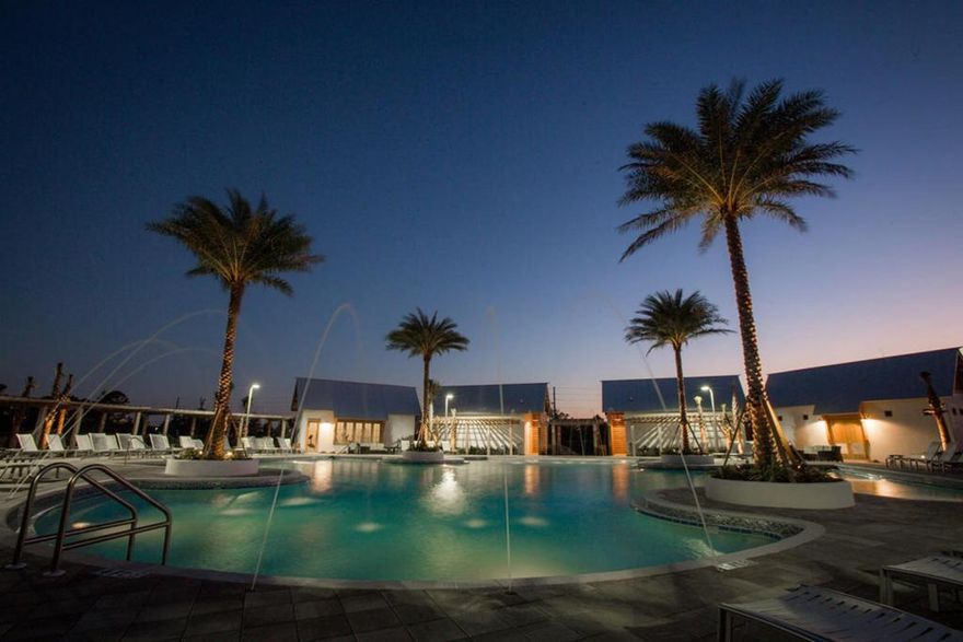 The Bahamas Triplex Townhome floor plan is uniquely designed to feature 3 bedrooms and 2.5 bathrooms with a 2 car garage. Home features include 10ft Ceilings, hardwood floors, Granite countertops, and stainless steel appliances to name a few. The Town of Prominence is located on HWY 30A between Seagrove and Alys Beach. Residents will enjoy easy access to a beautiful Town Center, Resort style pools, Fitness Center and Private Shuttle Service to the beaches of 30A. ''The Hub,'' the community's town center includes restaurants, shops, and an amphitheater with covered event pavilion, a cinema screen for movies as well as a stage for concerts and events. Subject property is unit 398