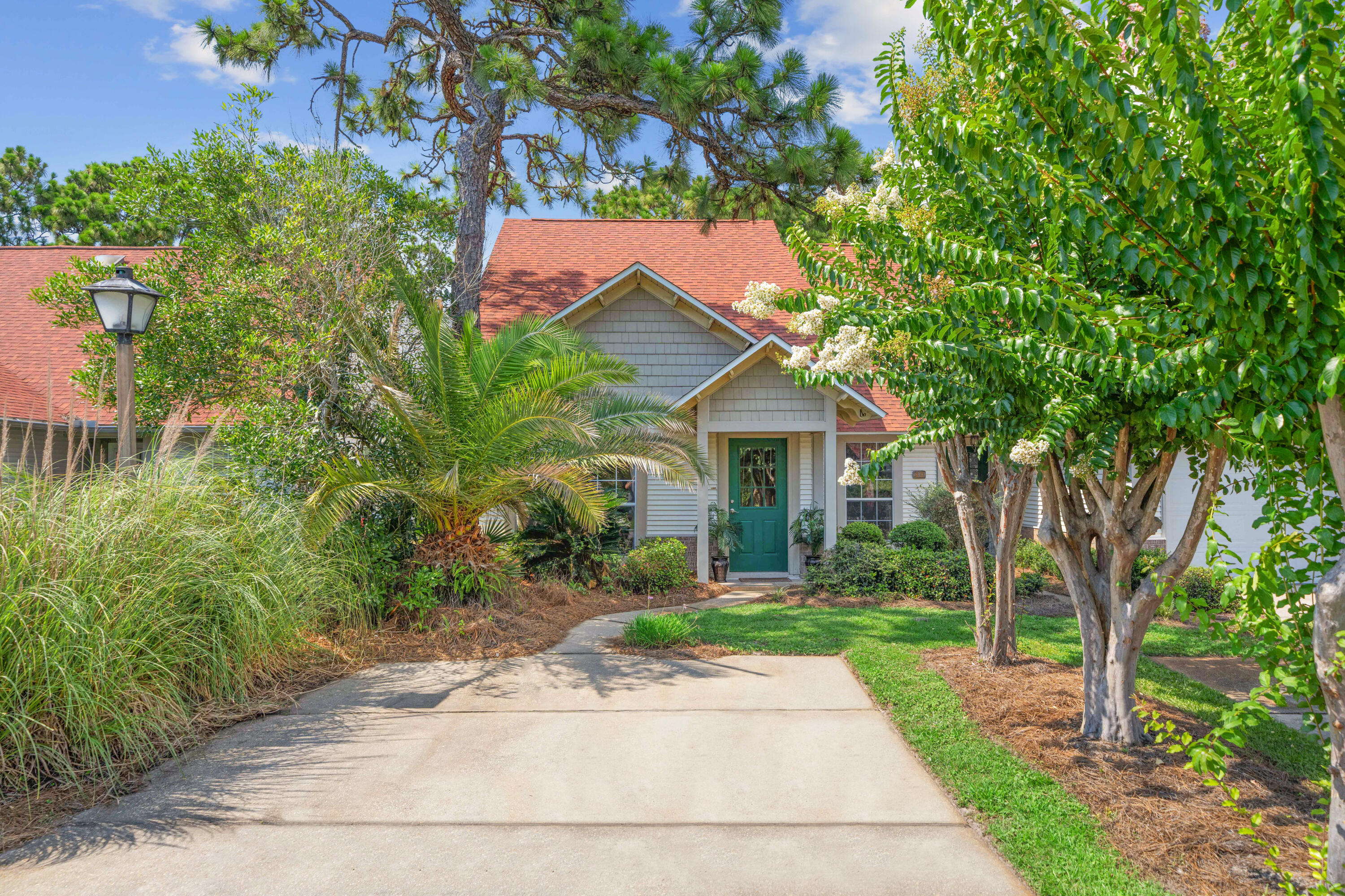 Amazing investment opportunity South of 98-Just 1.5 Miles from the Beach! Walk or bike to Butler Elementary and the sugar sands of 30A from a scenic nature trail located in the neighborhood. This beautiful townhome with fenced-in backyard places you right where you want to be--minutes away from beaches, top 30A restaurants, schools, and more. Nestled in the sought after Escada neighborhood across from the lake, this home offers the ideal blend of comfort, convenience, and coastal living. The neighborhood has a welcoming community vibe, complete with access to a community pool, perfect for relaxing after a day at the beach or meeting neighbors. Inside, the home features an open-concept layout complemented by vaulted ceilings, large windows, and an abundance of natural light. The kitchen has a breakfast bar, stainless-steel appliances, and plenty of storage space--perfect for every day living or entertaining. This home is completely carpet-free, with tile flooring in downstairs common areas and durable LVP throughout all bedrooms, the stairs, and the upstairs level--making cleaning a breeze. The first-floor guest bedroom offers flexibility, complete with two closets and convenient access to a full guest bathroom. The master bedroom is located on the second floor and has a walk-in closet and en suite bathroom. Its quiet, private location provides a comfortable retreat from the main living areas, making it a peaceful space for unwinding.
Enjoy Florida living on the screened-in back porch, ideal for morning coffee, evening cocktails, or simply enjoying the breeze. Beyond the porch, you'll find a large fenced-in yard--a standout feature that's hard to find in this area, offering privacy, room to play, garden, or even space for pets. There is also a deck for outdoor cooking, relaxing, and entertaining.
Whether you're searching for a full-time residence, beach getaway, or an investment property, this townhome delivers the 30A lifestyle with unbeatable walkability, charm, and amenities. This is a great opportunity to get South of 98 at an attractive price. Don't miss your chance to make this wonderful home yours!