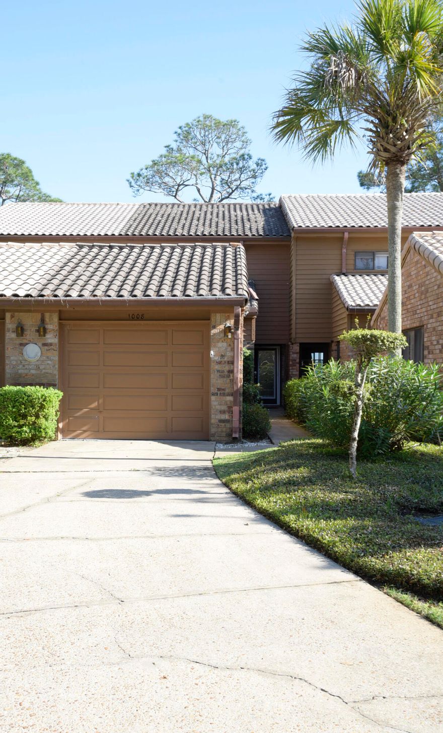 MILLION DOLLAR VIEWS OF BAYOU! This 3/3 townhome is in pristine condition! From the moment you walk through the leaded glass door you will be swept away by quality of this waterfront unit. Neutral colors throughout to suite any decor. Kitchen features stainless appliances (ice maker not warranted) and granite countertops. Main living area has gas fireplace flanked by beautiful built in's. Off the living area is the tiled Florida room with spectacular views of the Bayou. Outside you can enjoy the shared dock with your own boat lift and watching the dolphins play. One bedroom is on the main floor with two other spacious bedrooms upstairs. One bedroom features stunning views of the bayou. Unit even has a washer/dryer (not warranted). A single car garage finishes us this great unit.  Owner will consider a SMALL dog or cat but restrictions apply. Any pet must be spayed/neutered, housebroken and current on all shots. Water Oaks amenities include tennis court and a sparkling pool. Any person 18 years old or older must apply separately. Tenants required to carry renter's liability insurance.