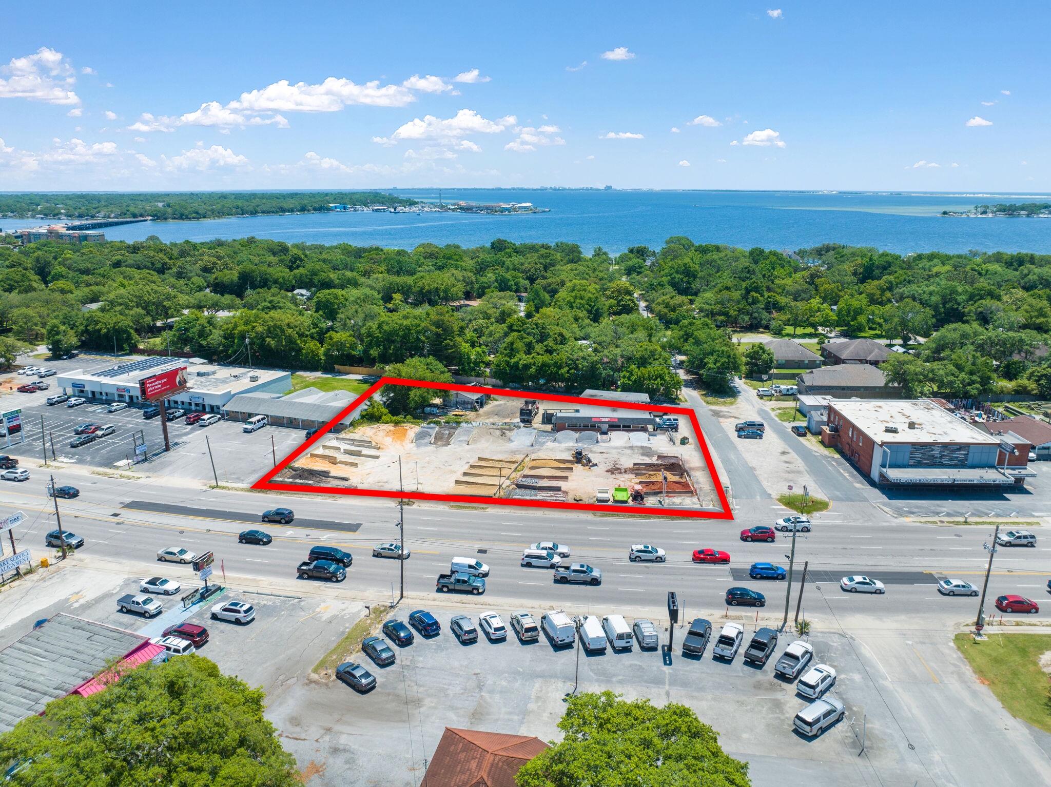Seller Financing available. Nearly one full acre of high traffic commercial property on the corner of N. Eglin Parkway and 2nd Avenue in Mary Esther. Traffic is over 40,000 daily trips with over 240 feet on Eglin Pkwy. There is a current tenant with a month to month lease but immediate occupancy is available to qualified buyers. Bring all offers.