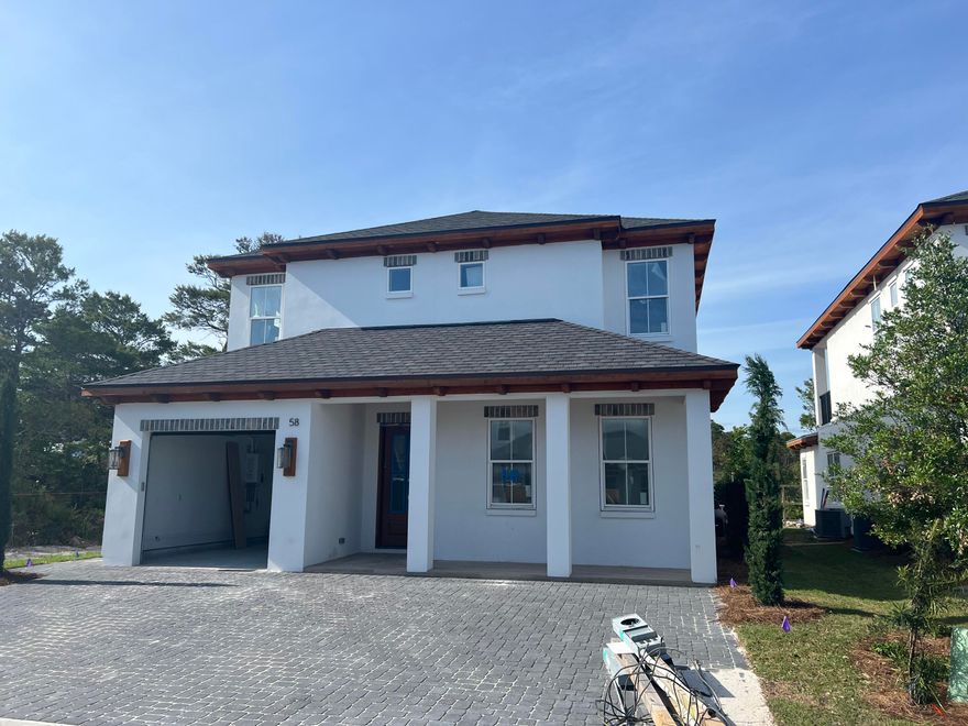 This beautiful New 4 bedroom house has tons of upgrades. 1 car garage, hardwood and tile floors, custom tile shower, standing soaker tub, shiplap on the walls, custom tile showers, 66in Fridge/Freezer, stainless steel appliances, Gas Navien tankless water heater. 2 Living rooms, Bunk Room , Fabulous Balcony. Private pool outdoor kitchen area. This is a 10 home subdivision just minutes away from the beach and near Gulf Place Center, great restaurants, shops, and golf.