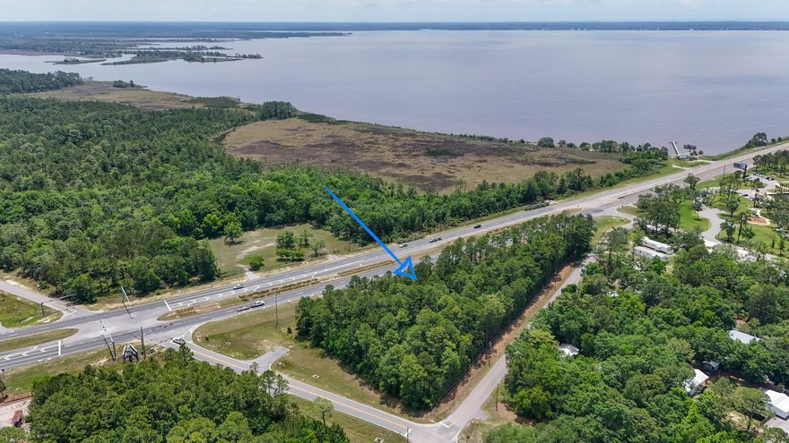 This offering consists of a 2.2-acre parcel with 650 feet of highway frontage on 331S just before entering the 331 Bridge. This area is commonly known as the 'Gateway to South Walton'.  The daily FDOT traffic count is 34,000 vehicles. Key infrastructure features include a deceleration lane, signalized intersection, and three paved access points, creating ingress and egress. The property is entirely 'high & dry' and sits adjacent to Grady Brown Park, a public recreational area offering direct access to Choctawhatchee Bay with swimming, fishing, and boat launch facilities. A view of the Bay is possible from the property.  Terrific location for retail, restaurant, motel, convenience store, or similar business where high traffic visibility is important. Survey, Traffic Impact Analysis avail.