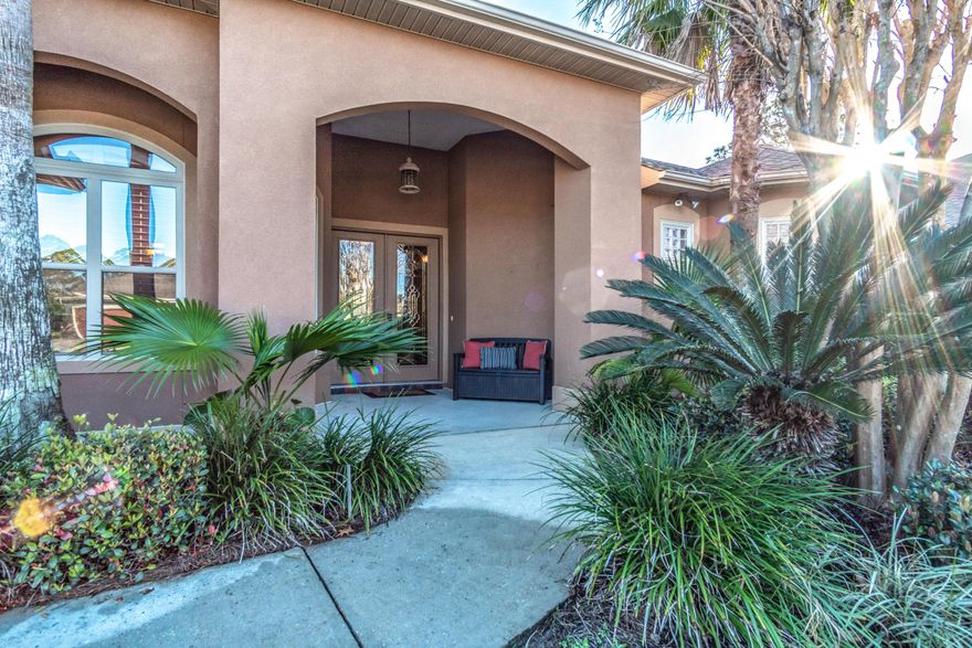 Mediterranean style 3 bedroom, 2 1/2 bath in beautiful palm tree studded neighborhood of Chardonnay Estates!! This spacious split floor plan features a new 50 year dimensional shingle roof, new LG black stainless steel range and microwave, new exterior and interior paint, triple-trey and dramatic 10' ceilings, double-sided gas fireplace, recessed lighting, crown molding, abundant natural light and more. Open kitchen is highlighted by Corian grey countertops, upgraded wood cabinetry, large breakfast bar and breakfast room. Family room off the kitchen provides comfortable gathering space for all your invited guest. Enjoy outdoor entertaining in the expansive screened lanai. Never change another propane tank again as this home is equipped with an outdoor gas line hook up for your gas grill.   Relax in a well-appointed master bedroom with patio doors to access the lanai, trey ceilings, master en-suite bathroom with walk-in shower including two shower heads, separate jetted tub, full width vanity mirrors, linen closet and spacious walk-in closet.  Numerous high-end touches throughout this home.  Close to top rated schools and only minutes to Destin Commons shopping and world renowned white sand beaches.  Home comes with transferable termite bond and home warranty.  Schedule your showing TODAY!