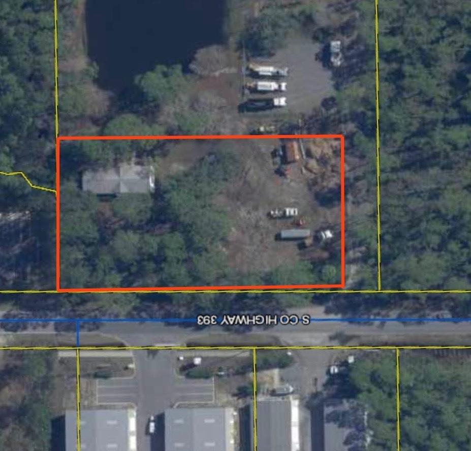 1 acre w/ 1800sf of office in Santa Rosa Beach FL. This property consists of 1/2 acre of fenced yard space, 1800sf job site trailer/ office and additional parking located between 30A and Hwy 98.