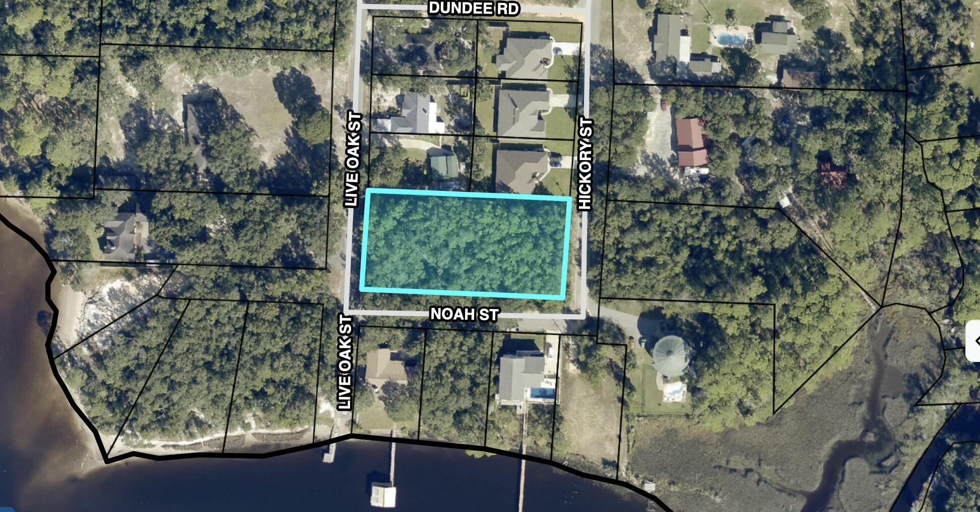 3 SEPARATE LOTS READY FOR BUILDER! Combining 3 lots, this .84 acres is across the street from the water in Holley-Shores subdivision. Subdivision has shared waterfront access via boat launch & dock (located at the end of Live Oak St).