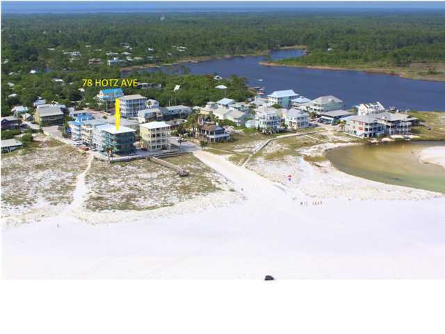 ''Sunset II'' offers panoramic views of the Gulf of Mexico, Western Lake and Grayton's vast state-preserved dunes and beaches. Located in ''downtown'' Grayton Beach, this beach house features 6 bedrooms, 4.5 baths, a very grand great room (kitchen, living, dining), and wrap-around decks on each level. See the Gulf, lake, State beaches, and entire town from these balconies! Step outside onto the beach, launch a boat at the lake a block away, or go fishing in the Gulf. Shop across the street or walk next door to The Red Bar for dinner. Public boat access at lake, or launch boat, sea kayak, etc from beach. Sunset II is a wonderful vacation getaway with good rental potential. Enjoy the best the Emerald Coast has to offer.