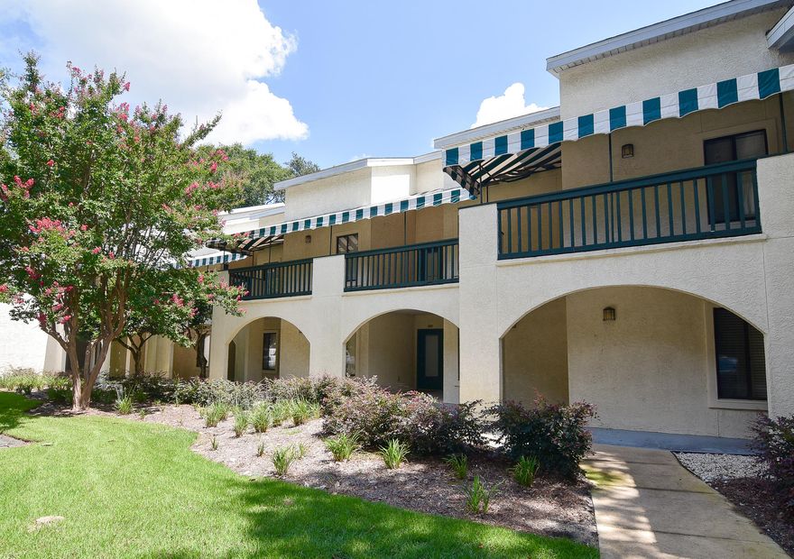 A MUST SEE! Motivated sellers are offering this fully renovated, move-in ready Lakeside condo at Bluewater Bay has access to the lifestyle amenities including 12 professional tennis courts, a  PGA golf course, swimming pools and access to the Bluewater Marina. Upon entry, you will find a single bedroom with access to the guest bathroom nicely stated with a subway tiled shower, white vanity and Kohler fixtures.  Luxury Laminate flooring compliments the modern stylish kitchen with stainless steel appliances and seamless Italian Carrera Marble. The kitchen flows through to the living room and private rear balcony. Upstairs are two more bedrooms including the master bedroom  complete with it's own ensuite updated master bath and private balcony. HOA is replacing awnings on all buildings soon.
