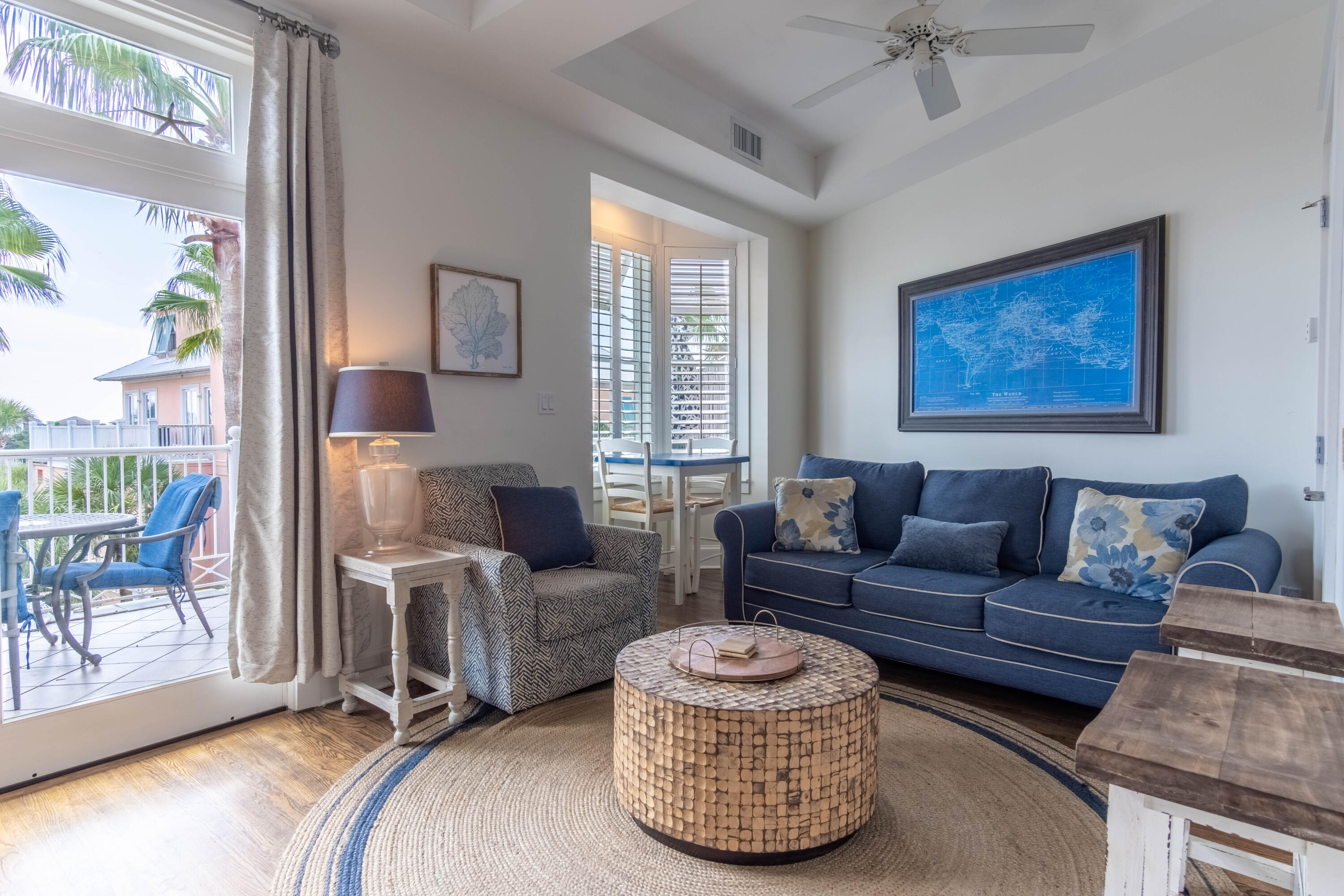 Superbly located to the exquisite amenities and activities of 30A and Pier Park. Just a 5 minute walk to the beach, this stunning and updated 1 BR and 1 1/2 BA condominium is within the envious community of Carillon Beach Resort. Furnished in a light and airy decor with a living and dining room floor plan, an open kitchen, a half bath, in unit laundry, and with a spacious balcony on the first floor overlooking the town center with views of the lake. On the second floor are the large bedroom with a sitting area and a bath with a skylight. Lake and Gulf views can be seen from the second floor. Appointed with new stainless steel appliances, new Kohler sink and faucet, planation shutters, refinished hardwood floors downstair, new LVP upstairs, and tile in the baths. Carillon Resort offers  an abundance of amenities including 3900 feet of beach frontage with 7 beach accesses, 3 pools including a Gulf front pool, coffee shops, wine bar, restaurants, yoga and health spa, salon, basketball, playground, pickle ball, local artist shops, bike and water-sport rentals, fishing, and tennis. Rosemary Beach and the beaches of 30a are within a 5 minute drive west, and the bustling entertainment of Pier Park is about 10 minutes to the east. Come see this condo and enjoy the beach lifestyle!