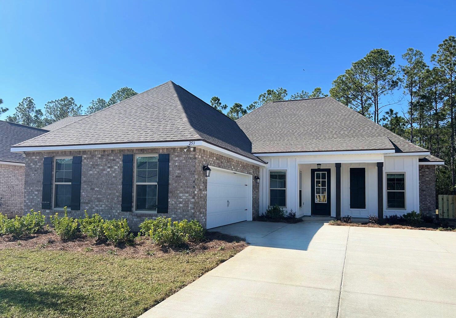 Awesome builder rate plus FREE refrigerator. Restrictions apply.Located on a corner lot the HENRI III G in Bird Song at Hammock Bay community offers a 4BR, 3BA, open design with separate dining. Upgrades added (list attached). Features: separate vanities, garden tub, separate custom tiled shower, and walk-in closet in master bath, tray ceiling in master bed, kitchen island, walk-in pantry, covered porches, crown molding, recessed lighting, smart connect WIFI thermostat, smoke/carbon monoxide detectors, landscaping package, architectural 30-year shingles, flood lights, & more!Energy Efficient Features: water heater, electric kitchen appliance package, vinyl low E windows, & more! Energy Star Partner.