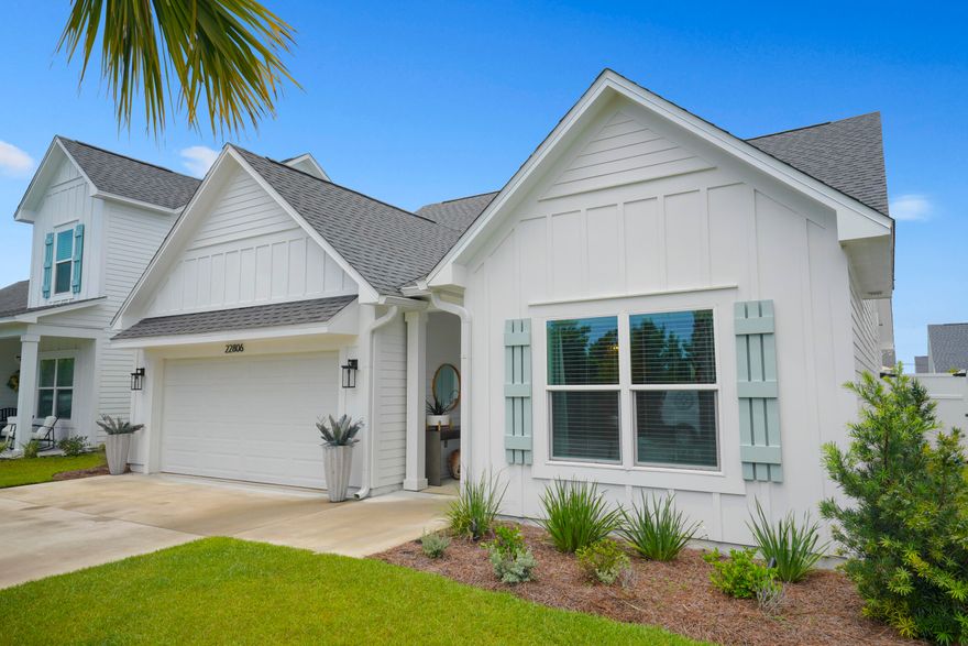 Discover the perfect blend of luxury, comfort and convenience in this charming beach home located in West Panama City Beach, just a short distance from the pristine beaches in the area.This home also features the convenience of nearby restaurants and shopping, as well as easy access to Lake Powell Park, offering recreational activities and a public boat ramp. This home boasts a projected Annual Rental Income between $45K-$55K!  Professionally re-designed and beautifully appointed inside and out, this home is situated on a spacious lot that has been tastefully landscaped, and has a fenced back yard with a hot tub and fire pit, ideal for outdoor activities and gatherings. A grand foyer invites you to an open living and dining area with ample natural light. The kitchen is spacious and features a large island providing additional seating, stainless steel appliances, a separate beverage bar, and a pantry with plenty of storage.
The primary bedroom features an en-suite bathroom, with a large walk-in shower, double vanity, and walk in closet. There are two additional bedrooms, both generously sized, a full bathroom, laundry room, 2 car garage, and additional driveway parking. This delightful home offers a fantastic opportunity to enjoy coastal living with the convenience of several nearby beach accesses and amenities from which to choose. Don't miss the chance to make this YOUR beach home!