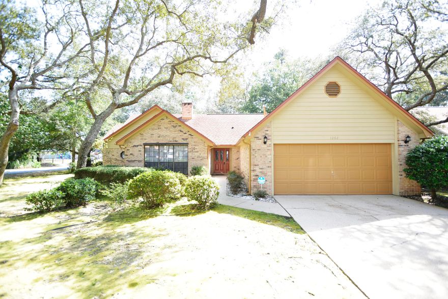 Rare Find...Single Owner, All Brick, 3/2 Home, .42 Acre Corner Lot, Shaded W Live Oak Trees In Bluewater Bay. Huge Fenced In Backyard Big Enough For Pool Or Tuck Your Boat Away W No HOA Restrictions. Corner Lot Adjacent To Children's Park & Woodlands Pool. Split Floor-Plan Boasts Large Family Room W Beautiful Fireplace. Sizeable Kitchen W Sunny Breakfast Room & Counter Top Bar. Lovely Dining Room Is A Focal Point To The Home. Ensuite Master Bedroom W Double Vanity, Jacuzzi Bath & Separate WC. Laundry Room/Washer & Dryer Convey. Home Is In Tip Top Shape!  AC Replaced Last Year. Multi Dimensional Shingle Roof 2(004) Lawn Pump/ Sprinkler System. Hop Skip & A Jump Over Midbay Bridge To Destin Beaches, 15 Minutes To Eglin! Top Rated Schools. Centrally Located This Home Is an Outstanding Buy!