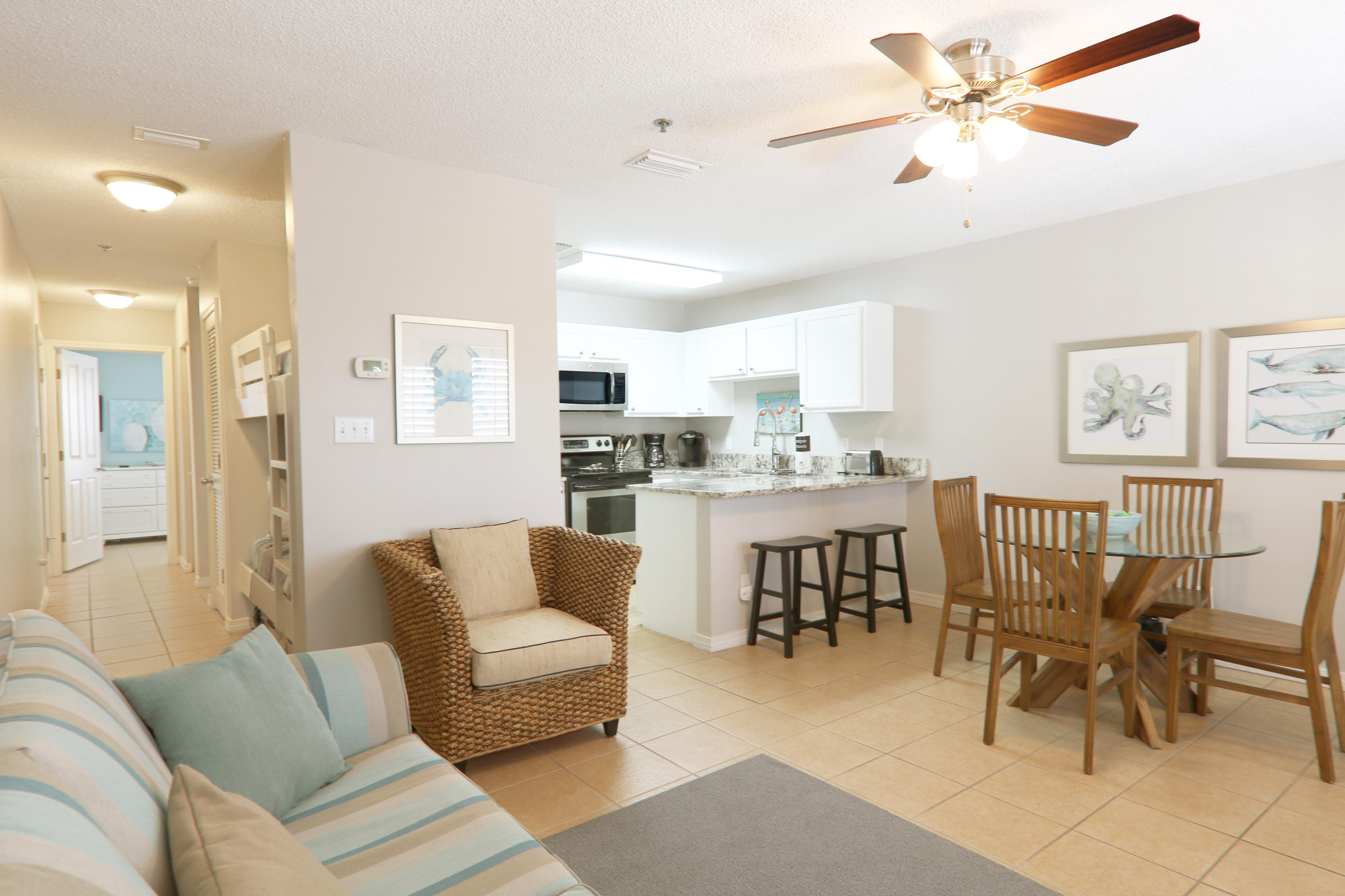 Grand Caribbean West has a heated pool and hot tub and beach access is across the street, just a few steps away. Crystal Beach is convenient to Shopping, Dining, Golfing, Movie Theaters and more. Buyer to confirm dimensions and Square Footage.TOP FLOOR in Grand Caribbean West with amazing Gulf Views from the oversized balcony. This condo comes fully furnished and rental ready with a rental history of 30k gross rental income. Sleeps 6 people comfortably and includes the following: 1 Bedroom,1 Bath with bunks, sleeper sofa, and full size kitchen, and washer dryer. Owners have made many improvements to this property over the years of ownership however the kitchen remodel was just completed and ready to enjoy.