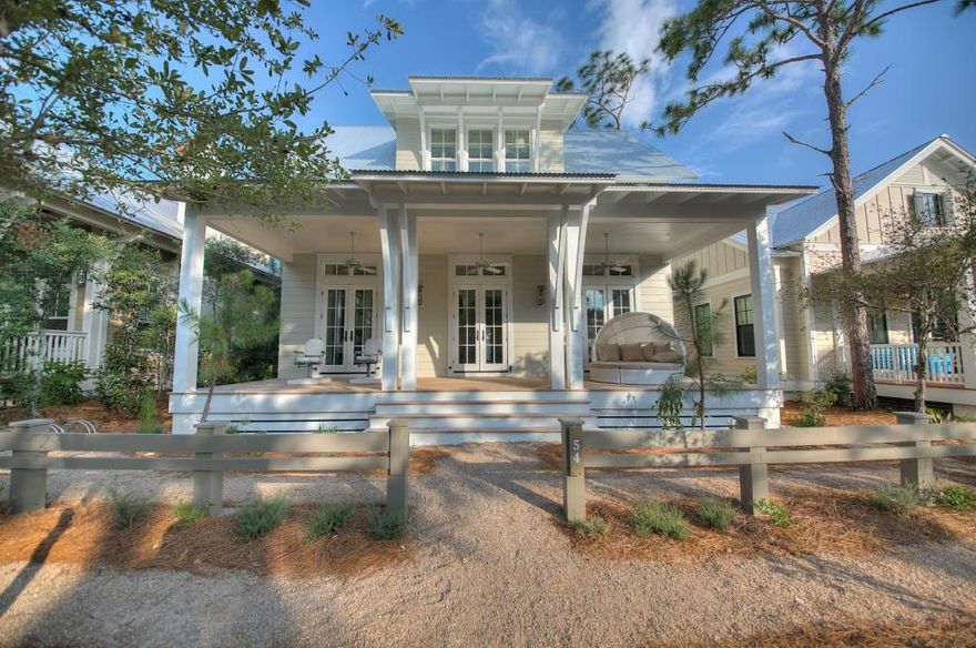 This brand new Watercolor home is completed and move in ready! Designed by Stackable Squires and built by Cole Construction & Development there is no detail overlooked. Perfect location right across the street from a quiet park. This home has 5 bedrooms/5.5 baths, a bunk room and a carriage house. Master bedroom is on the first floor. There is plenty of living space in this home with a large living room on the first and second floor. Outdoors has a beautiful living area with outdoor fireplace and a pool. Other features include 16 SEER HVAC, Wolf appliances in the kitchen, dual washer/dryer, 12' ceilings, wood floors throughout common spaces.