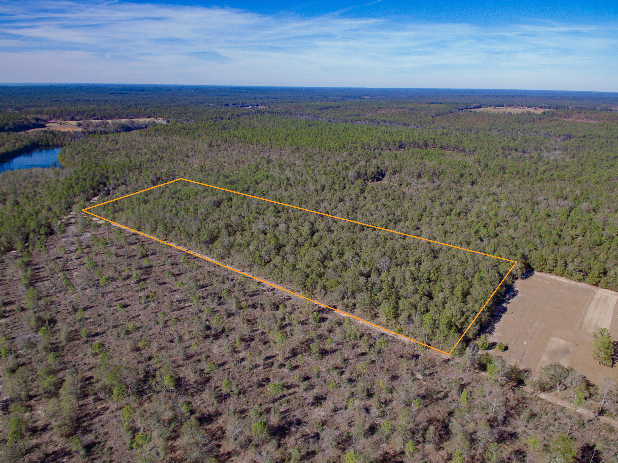 Large rectangle shaped piece of land. Mostly wooded in a very quite area with homes mostly on larger pieces of land. Easy access to I-10, approximately 13 miles to Crestview. Property sits within 1/2 mile to Black Water State Forest. This area is highly desirable for country living with easy access to I-10 for short commute to Crestview, Milton, Pace or Pensacola.