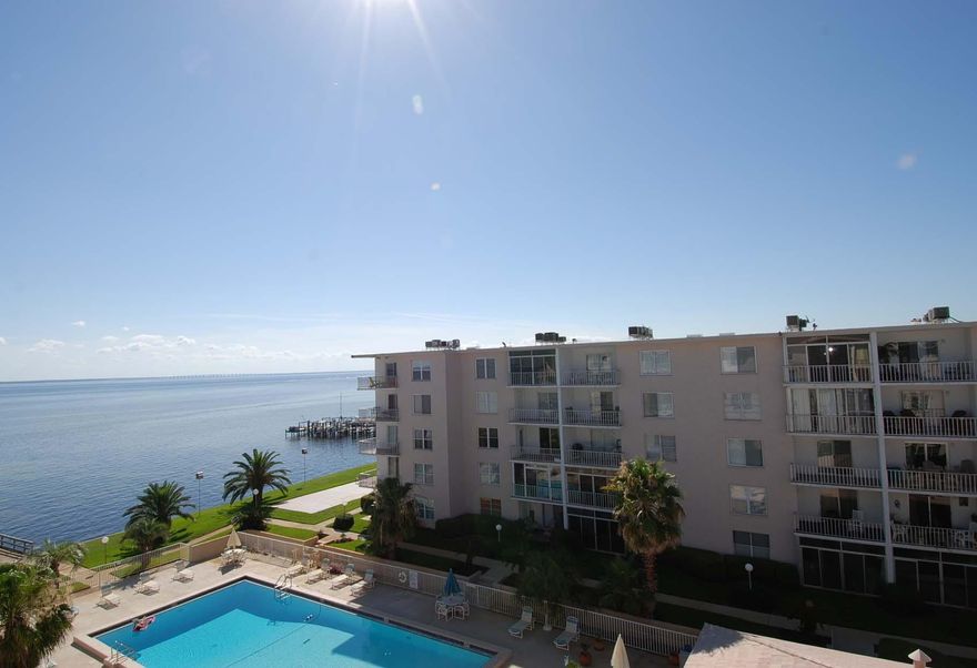 SAVOR THE FINER THINGS IN LIFE ... Affordable Bay front living at its best! Low-profile, best kept secret, located in downtown Destin. Newly remodeled kitchen and new flooring! Pristine & very well maintained, close to all the excitement, dining, shopping, and entertainment that anyone could ask for, but set along the back roads for a more quiet, peaceful, and relaxing setting. Amenities include a huge heated pool, fishing dock, laundry facilities on each floor. This unit is in immaculate condition. Enjoy a cup of coffee in the morning and a cocktail in the afternoon, from your private balcony with views overlooking the peaceful bay, swimming pool and well manicured grounds.