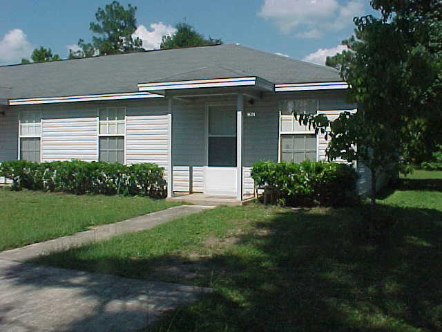 New Carpet!! You'll want to see this well kept 2BR/1BA triplex unit w/ off-street parking, back patio, w/d hook up, and more. Call today to set up showing.