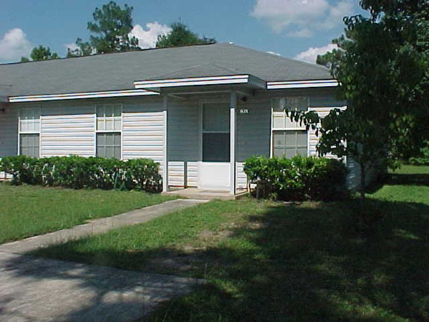 New Carpet!! You'll want to see this well kept 2BR/1BA triplex unit w/ off-street parking, back patio, w/d hook up, and more. Call today to set up showing.