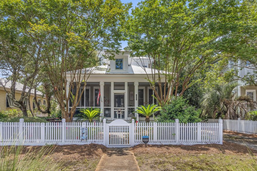 This charming three-bedroom, three-bathroom home is located in the prestigious  Beach community, directly behind the community pool and bathhouse. It is just a short walk to your deeded beach access, allowing you to enjoy the serene environment that surrounds this beach house. This Florida cottage is an excellent choice as a primary residence, second home, or vacation rental. Its quaint coastal architecture embodies the relaxed culture of the area. A white picket fence frames the house, and a large screened porch welcomes you at the front door. Inside, you will appreciate the airy feel of the 11-foot ceilings, while rows of beautifully cased Pella windows throughout the home provide abundant natural light. This beautiful home has been updated with over $150,000 in renovations. Here is a list of the updates:
- New metal roof
- New tankless hot water heater
- New flooring
- New floor joists
- Completely rebuilt back landing and deck
- Removed cabinets above counters to open up space
- Professionally painted all cabinets and the entire exterior
- All new light fixtures and ceiling fans
- New sink hardware
- New bathroom hardware and mirrors
- New shades and window treatments