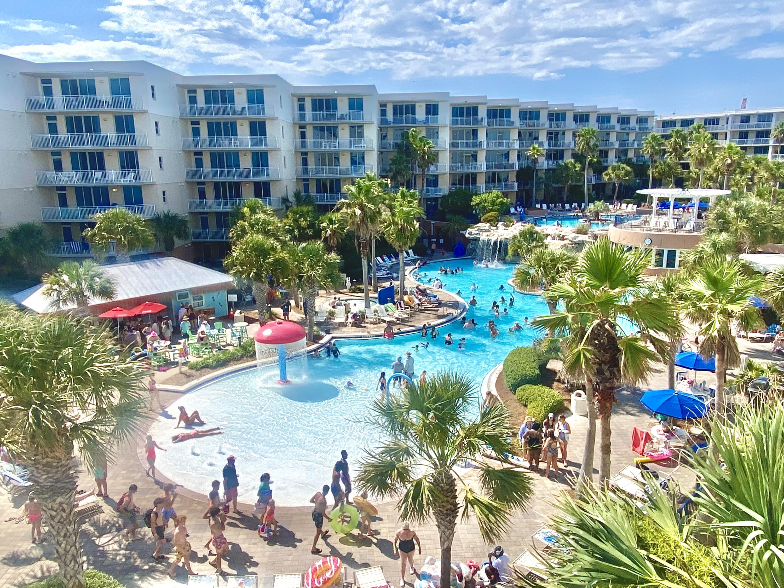 Ooh La La Jazzy Modern Delight! 3rd Fl 100% Remodeled Gem! A beachy colorful chic condo in the #1 popular FUN Family Beachfront Resort! Sprawling 1,292sf plan- Quiet Eside 2br/2.5ba +bunks. A333 features retro vibe accents, freshly painted w/wallpaper to die for, new lighting. Improvements: All paint, wallpaper, all furniture and decor, tvs, all light fixtures/ceiling fans, all sinks and bathtub fixtures, countertops, -all >than a year old. Waterscape is 1 of THE BEST of the Emerald Coast condos! $54k income fr Oct'24-Aug.10,25! Sleeps 8 comfortably. Coastline views of sparkling Gulf/beach waters. LR+Both br w access to private balcony; Owner storage. WOW style amenities: 490' beach, LazyRiver, 2 hot tubs, TikiHut, 0-edge pool, 10' waterfall, kiddie playpark, fitness & so much more!