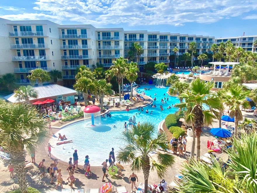 Ooh La La Jazzy Modern Delight! 3rd Fl 100% Remodeled Gem! A beachy colorful chic condo in the #1 popular FUN Family Beachfront Resort! Sprawling 1,292sf plan- Quiet Eside 2br/2.5ba +bunks. A333 features retro vibe accents, freshly painted w/wallpaper to die for, new lighting. Improvements: All paint, wallpaper, all furniture and decor, tvs, all light fixtures/ceiling fans, all sinks and bathtub fixtures, countertops, -all >than a year old. Waterscape is 1 of THE BEST of the Emerald Coast condos! $54k income fr Oct'24-Aug.10,25! Sleeps 8 comfortably. Coastline views of sparkling Gulf/beach waters. LR+Both br w access to private balcony; Owner storage. WOW style amenities: 490' beach, LazyRiver, 2 hot tubs, TikiHut, 0-edge pool, 10' waterfall, kiddie playpark, fitness & so much more!