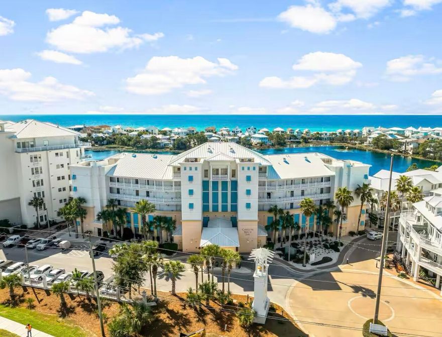Welcome to Carillon Beach ~ a private and exclusive Emerald Coast Community. This STUNNING *4th Floor* Condo is Lakefront, featuring beautiful Ocean Views (ONLY 4th and 5th floor condos have views of the Gulf) and has been recently renovated to be completely Turnkey! With an HVAC system just two years old, this bright and elegantly appointed One Bedroom / One Bath Unit offers beautiful decor and furnishings... and is PERFECT for your personal Beach Home and / or your Beach Investment Property! The open concept Living Room / Kitchen space overlooks the expansive Lake Carillon creating a picturesque setting.  A rare and thoughtful addition ~ a door separating the bedroom from the living area ~ enhances privacy and functionality. Just outside the living room is your private balcony complete with highend furniture. See the sunrises and sunsets for yourself ~ they are TRULY Breathtaking of lake and gulf! The Premier LOCATION cannot be overstated! Carillon is at the far west end of Bay County, is a gated and private beachfront community with nearly ONE MILE of its very own GORGEOUS white sand beaches on the Gulf Coast, with eight exclusive walkover beach access points. Residents and guests enjoy Resort-Style Amenities, including four pools, two hot tubs / basketball courts, NEW pickleball courts, neighborhood parks, a playground, a chapel, and the historic Carillon Bell Tower.... all of this PLUS the vibrant "Downtown Carillon" area which features upscale shopping / boutiques / local eateries / wine bar / coffee shops / yoga studio / fitness facility / salon and spa...as well as kayak and golf cart rentals. This AMAZING Location has it ALL and is just minutes from the highly sought-after 30A and Rosemary Beach areas but ~ without the crowds. Carillon Beach IS the *Hidden Gem* you have been searching for!