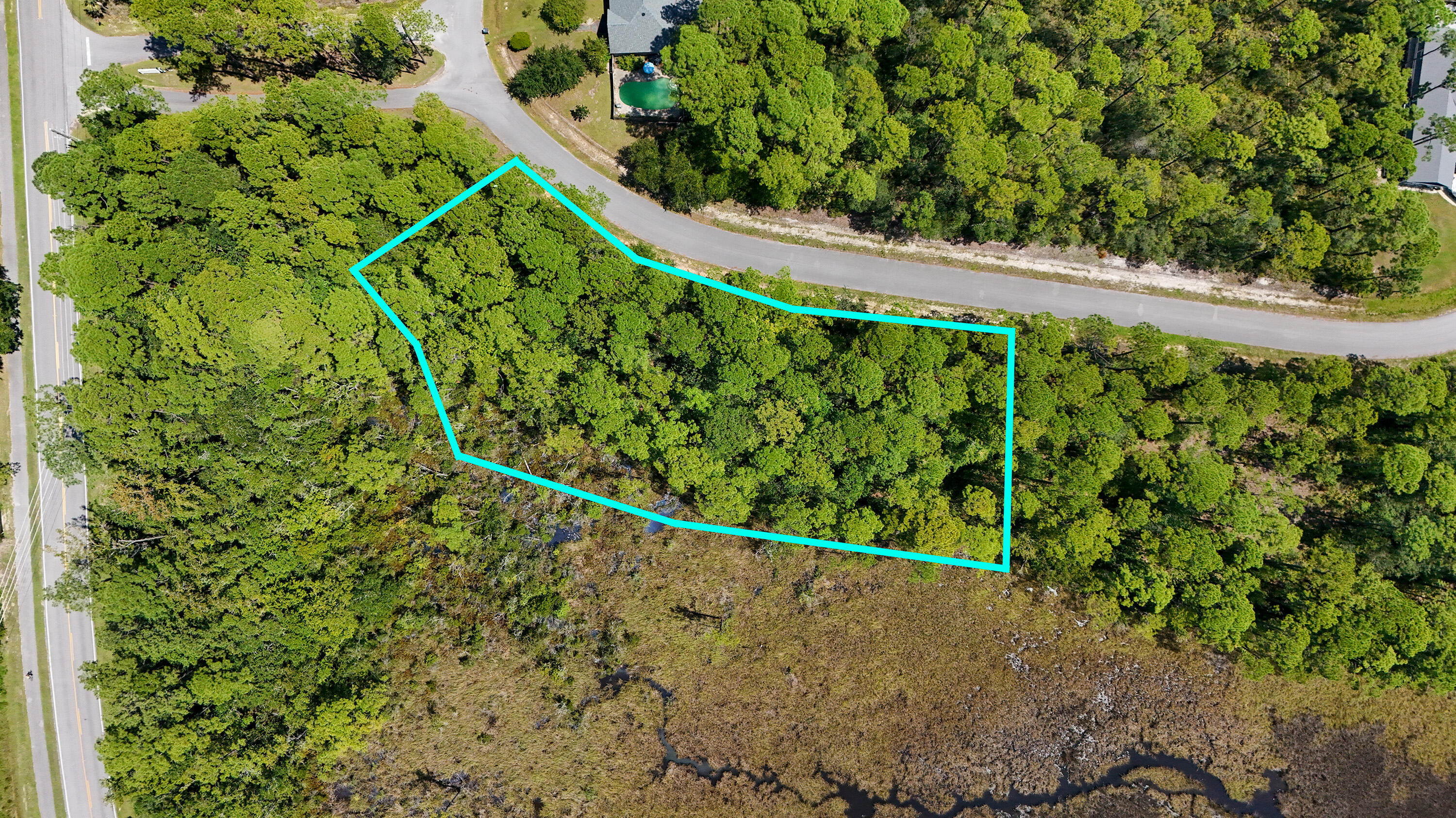 Discover the perfect setting for your dream home on this beautiful 0.46-acre lot located in the desirable Cross Creek community of Freeport. This homesite offers a peaceful, natural backdrop as it backs up to the scenic marshlands that flow directly into Choctawhatchee Bay, providing stunning views and abundant wildlife.With public water and sewer available, this lot is ready for your custom build. Enjoy the privacy and tranquility of the area while still being conveniently located near local schools, shopping, dining, and just a short drive to the white-sand beaches of the Emerald Coast.Whether you're looking to build now or invest for the future, this property offers a rare opportunity to own a piece of coastal Florida living. NO HOA but covenants and restrictions are in place.