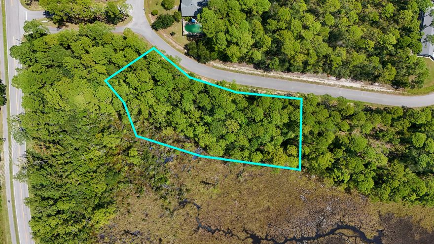Discover the perfect setting for your dream home on this beautiful 0.46-acre lot located in the desirable Cross Creek community of Freeport. This homesite offers a peaceful, natural backdrop as it backs up to the scenic marshlands that flow directly into Choctawhatchee Bay, providing stunning views and abundant wildlife.With public water and sewer available, this lot is ready for your custom build. Enjoy the privacy and tranquility of the area while still being conveniently located near local schools, shopping, dining, and just a short drive to the white-sand beaches of the Emerald Coast.Whether you're looking to build now or invest for the future, this property offers a rare opportunity to own a piece of coastal Florida living. NO HOA but covenants and restrictions are in place.