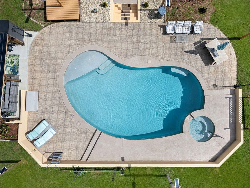 **Seller Offering Up To $5,000 to USE YOUR WAY!!  Closing cost, rate buydown, etc!!  !!Your North Crestview Oasis Awaits!! Discover this beautifully upgraded 3-bedroom, 2-bathroom gem nestled on a 1-acre lot in North Crestview. With 2,548 square feet of thoughtfully designed living space, this home is the perfect blend of comfort, style, and function.Step into your private paradise featuring an amazing in-ground pool complete with a brand new poolside cabana and luxurious high-end furniture--perfect for relaxing or entertaining in Florida's sunshine. The expansive, leveled parking area with a retaining wall offers ample space, including room for your RV. Enjoy ultimate privacy with a brand new privacy fence topped with a sleek privacy shade. Need space for hobbies or storage? This property delivers with 4 outdoor sheds, dedicated workshop, and plenty of room to roam.
Inside, you'll love the newly renovated master bathroom with elegant tile finishes and a spa-like feel. The kitchen boasts a new stainless steel refrigerator (conveys with the home), and the Florida room is climate-controlled with a mini-split system, making it the perfect year-round retreat.
Additional upgrades include:
*State-of-the-art water heater
*Smart security system for peace of mind
*Numerous modern updates throughout the home

This is more than a home it's a lifestyle upgrade. With everything already done for you, all that's left is to move in and enjoy your private North Crestview retreat.

Schedule your showing today paradise is calling!

