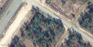 .25 Acre +/- Beautiful Lot in Sunny Hills - Beginning of Shenandoah Blvd at HWY 77. This intersection is currently under development for 4 Lane Highway and is poised to be a hot spot of commerce. Don't miss this opportunity! Call for your showing today