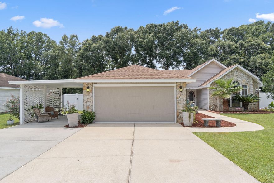 Amazing home located in north Pensacola, only 20 minutes from Downtown Pensacola and only 30 minutes to the white sandy beaches and emerald waters of Pensacola Beach. This home is nestled at the end of a dead end street which provides a quiet, low traffic atmosphere. You'll immediately notice when you drive up to this great home that it not only has a two car garage but also a covered parking area beside it which would be great for a smaller boat or additional parking. Along the other side of the home there is a double gate leading to the back yard which already has a 50amp hook up for your Camper or RV. The inside of the home has much to offer such as a large family room with vaulted ceilings, open kitchen/dinning area, and three large bedrooms and two bathrooms.