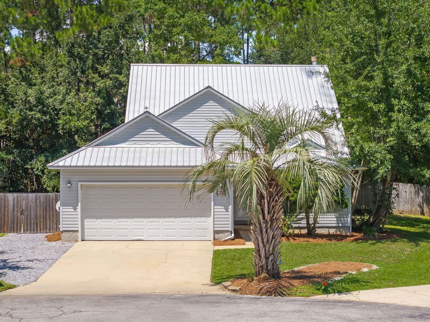 Welcome to Magnolia Creek -- a quiet, gated community in Santa Rosa Beach just *five minutes* from the Dune Allen public beach access. Talk about location! This home has tons of potential, starting with a spacious downstairs Master bedroom and Master Bath that opens into the family room. Upstairs are two additional bedrooms and a loft area that can serve as an office.. And let's talk about the kitchen - brand new appliances. with a nice breakfast area. A dining area is also just off the kitchen. The family room is a comfortable size and opens to the screened porch. Sitting on a half-acre lot, the fenced backyard offers great outdoor space -- plus there's a screened back porch and large deck in excellent shape that expands your living space to the outdoors. Plenty of room to park a boat, trailer or RV with a large gate for access. There's a lot to love here  and even more you can do with it.  $5k buyer closing cost concession.