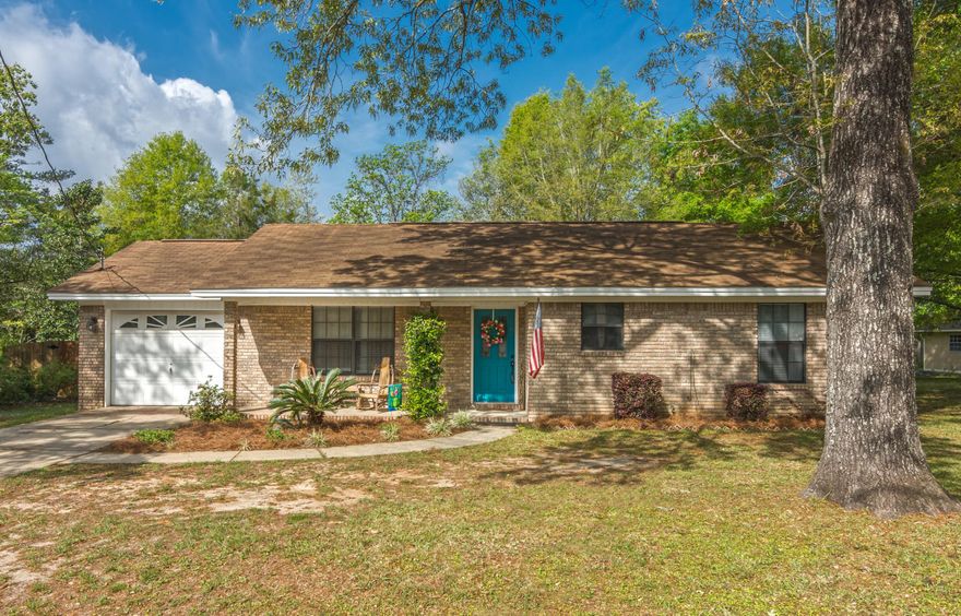 Adorable 2 bd/2 ba home centrally located and situated on a large lot in N Crestview. New laminate flooring throughout. Galley kitchen equipped with stove/oven, dishwasher and refrigerator. Nice sized bedrooms and baths. Single car garage and level lot. Great privacy fenced-in backyard. Perfect starter home or for the empty nesters looking to downsize. Schedule your showing today! PROPERTY TO BE SOLD IN AS IS CONDITION.