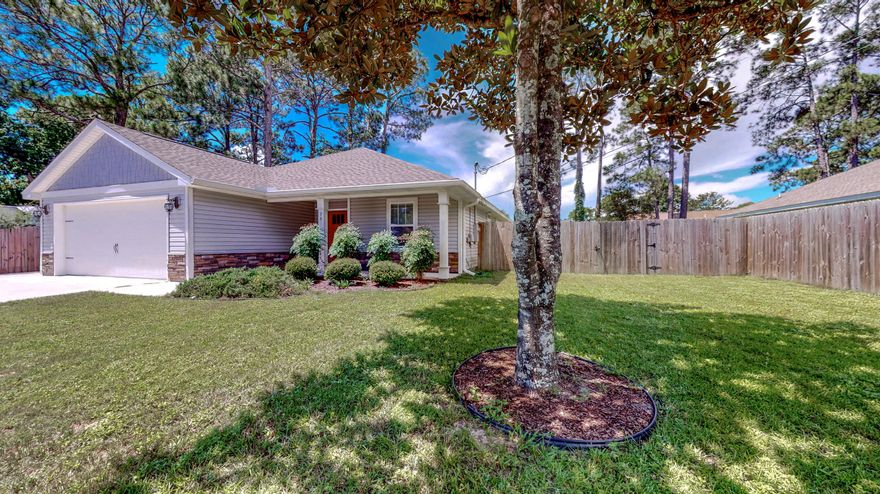 Welcome Home! Looking for a home near Hurlburt Field AFB? Want great insurance prices? If so, you've found the house! This newer built home offers 3 bedrooms, 2 baths with lots of upgrades to include an additional parking pad which would be perfect for a boat, RV, trailers, or jet skis, along with exterior gutters, covered rear patio, and a double gate leading into the large backyard. Interior upgrades include hardwood flooring, soft close drawers, blinds throughout, granite counter tops in kitchen, double vanity in the master bathroom with soaking tub, separate shower, Large closet and separate commode room!