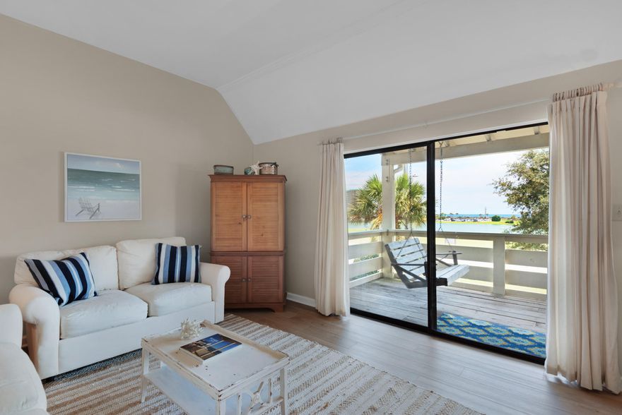 RARE OPPORTUNITY FOR GULF OF MEXICO VIEWS AT AN UNBEATABLE PRICE!  Lowest priced unit at Seascape with Gulf views!!  This must-see spacious 2 Bedroom/2 Full Bath, top-floor condo showcases spectacular water views that overlook both Stewart Lake AND the Gulf of Mexico! Extensively updated in 2018/2019 with all new Luxury Vinyl Plank flooring throughout the entire unit, new Kitchen, and new Bathroom updates - over $50,000 in upgrades! New HVAC in 2015 and new Hot Water Heater in 2019. Fully furnished and rental-ready. Great Balcony views! The setting is so tranquil and serene, and you are just a few steps from the large free-form sparkling swimming pool. Easy walk to the Beach! Park your car at the condo and walk over to the dazzling white sands and emerald green water!