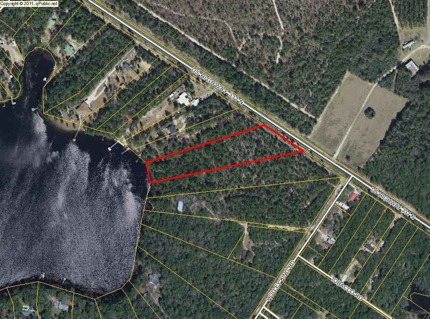 Beautiful 3.66 acre waterfront acreage, perfect for that dream home or weekender. Wooded enough to provide plenty of privacy, yet so close to town and shopping. Or use as a campsite for the family. It is located on Kings Lake a 500 acre fishing lake with trophy size bass, bream, catfish and more! City water is available.