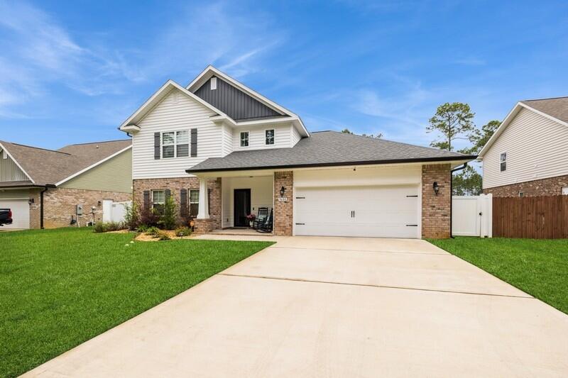 Welcome to your Navarre retreat at Creets Landing. This two year old  home is  charming.  It offers peace, privacy, and style. Some amazing updates such as the elegant marble backsplash in the kitchen to the easy-draw shutter blinds that let the Florida sunshine pour in, every detail adds comfort and a vibrant feel. Step outside to enjoy a newly vinyl fenced backyard with two gated entries perfect for pets, play, or weekend gatherings. With no homes directly in front or behind, you'll love the added sense of space and serenity. Located just minutes from Navarre's top-rated schools, shopping, and the beautiful Navarre Beach--this home checks all the boxes. Your Paradise awaits!