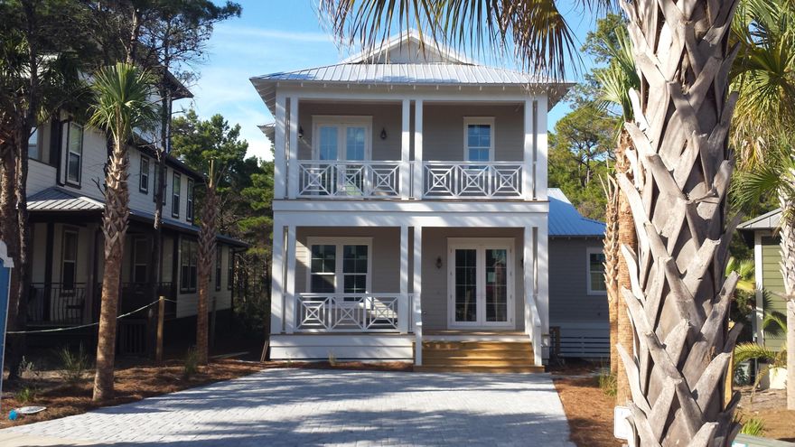 Buy now and be ready for 2016 rental season. This 5 bedroom 4.5 bath home will be a rental machine! Great price per sqft on a new home. Builder HAS CO! Home sits one of the largest lots in Seacrest Beach backing up to a natural common area. Private Path has been cut to take you to trail. This home is approx. 2806 sq ft heated and cooled & features, approx 700 sq ft of covered porches front and back. Finishings include hardwood floors, granite counter tops, stainless steel appliances and custom cabinets. This home has two master suites. Upgraded CAT5 wiring, window and door alarms. Perfect house for primary residence, 2nd home or vacation rental. Sqft and lot dimensions are approx. There is a $1000 new buyer $500 HOA capital Contribution fee and $100 new buyer tran