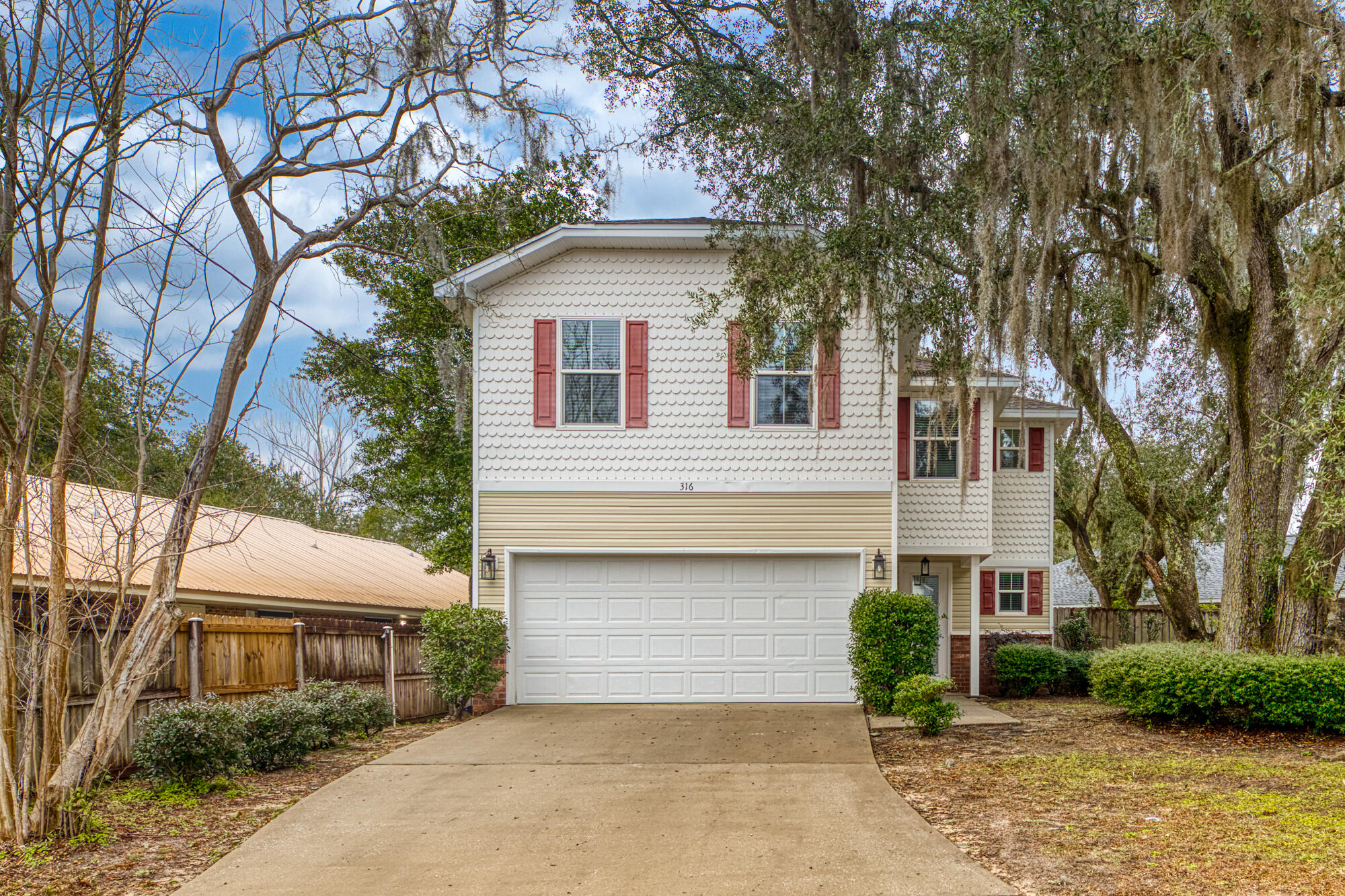 Enjoy renting this lovely home that is one block from the water with a marina close by. Super convenient location close to schools and shopping. This 3 bedroom 2 1/2 bath home is modern and bright. Marvelous updates have been done including new marble counter tops in kitchen and baths- plus new tile bath and showers, and all new stainless steel appliances with commercial style refrigerator. Fresh neutral paint throughout. Crown molding on first floor. New wood look tile on first floor and like new w/w carpet upstairs. Walk out back to your patio and enjoy this pet friendly home having a spacious fenced in backyard. Pets allowed with owner approval and $500 non-refundable pet fee.