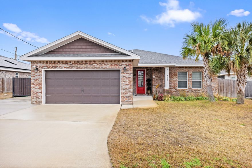 This contemporary home seamlessly combines modern conveniences with elegant design, making it the ideal choice for all homeowners.  The welcoming kitchen boasts stunning granite countertops, modern stainless steel appliances, breakfast bar and a cozy dining area.  The primary bedroom showcases a large garden tub, beautifully tiled shower equipped with updated glass fixtures, two walk in closets and trayed ceiling.  Throughout the home you will find plush carpeting in the bedrooms and elegant tile in the living areas.Outdoors, the property offers a fully fenced backyard, fully enclosed patio, sprinkler system and  additional concrete has been poured for extra parking (boat/ RV) or family gatherings.  Conveniently located near beaches and Hurlburt Field. This home truly has it all.
