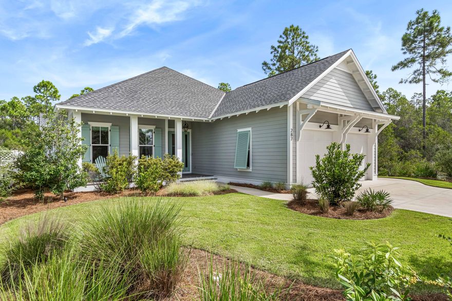 Nestled within the master planned community of WaterSound Origins, this quintessential coastal residence constructed by the distinguished Huff Home building team offers the epitome of luxury coastal living. The sought-after Ficus floorplan showcases an open living concept with over 2,500 square feet of thoughtfully designed living space all on one single level with four bedrooms and a two-car garage. The like-new condition coupled with the tasteful upgrades and furnishing package creates a truly unique and turn-key opportunity. Upon initial approach, the welcoming front porch bordered by lush vegetation leads the way to the entry foyer adorned with shiplap accents. The Chef's kitchen encompasses custom soft-close cabinetry, an oversized island, a professional Wolf and Sub-Zero appliance package, and quartz surfaces. The expansive living and dining areas are perfectly positioned off of the kitchen with direct access to the screened porch blurring the line between indoors and out while creating a true continuation of living and entertaining space. Synonymous with relaxation, the backyard features a grilling pad and custom gas fire pit with seating abutting to a wooded area providing the upmost privacy and tranquility.

The Kingsley wood flooring is carried into the main suite which overlooks the backyard and boasts a sumptuous ensuite with walk-in wardrobe, dual vanities, tiled shower, soaking tub, and private water closet. The additional three bedrooms incorporate ample natural light, storage, and nicely appointed ensuites.

WaterSound Origins provides residents with an impressive collection of amenities including the Villiage Commons pools and fitness center, tennis courts, pickleball courts, miles of nature trails, Lake Powell access, and the opportunity to join the famed WaterSound Club which offers an even larger array of exclusive amenities. Origins is also geographically poised minutes from the white sugar sand beaches and all of the world-class dining and shopping venues 30A has to offer. The WaterSound Town Center located in the front of the community is home to Publix, weekly Farmers Markets, and additional shopping and dining options. Inquire today to schedule a private viewing and start living the coastal lifestyle you deserve.